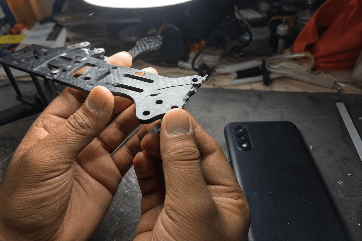 Carbon fiber splinters and frame stress cracks: Documenting damage for warranty