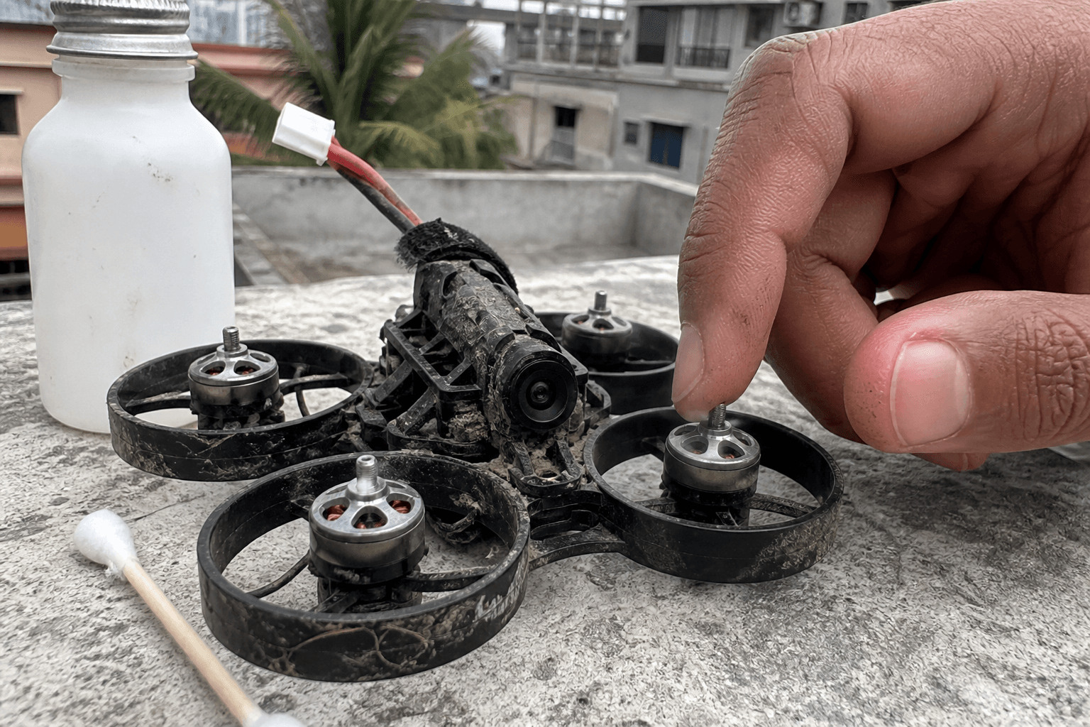 How to clean an FPV drone after a crash: Motor spin check (props off)