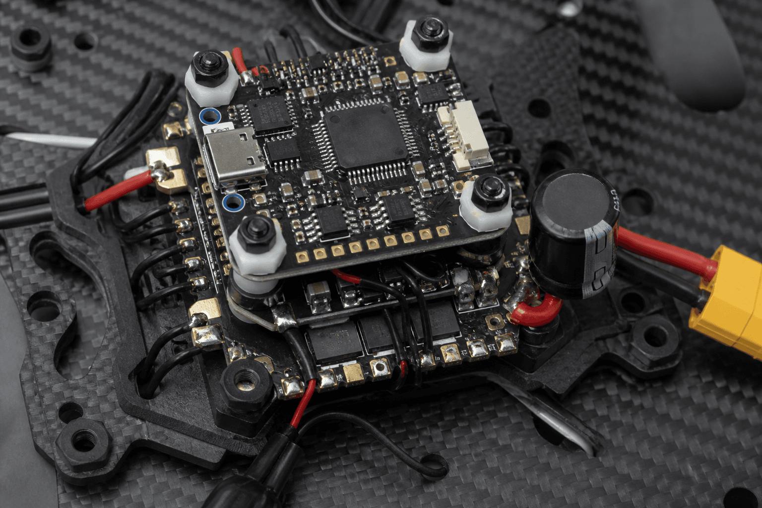 Stack soft-mount vs rigid: when each wins: Capacitors and stack layout
